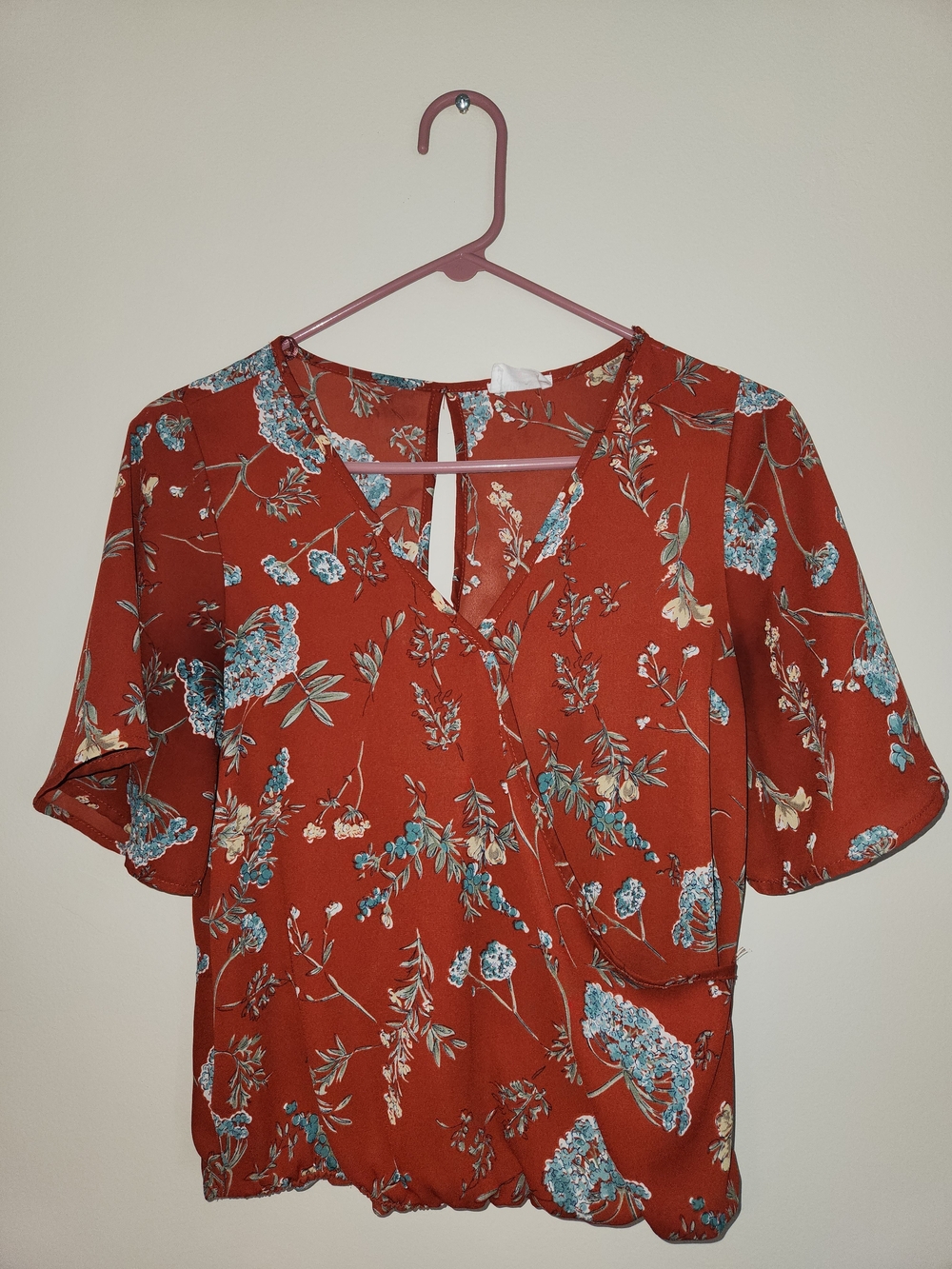 Sienna Sky Rust Floral Surplice Blouse with Blue Accents